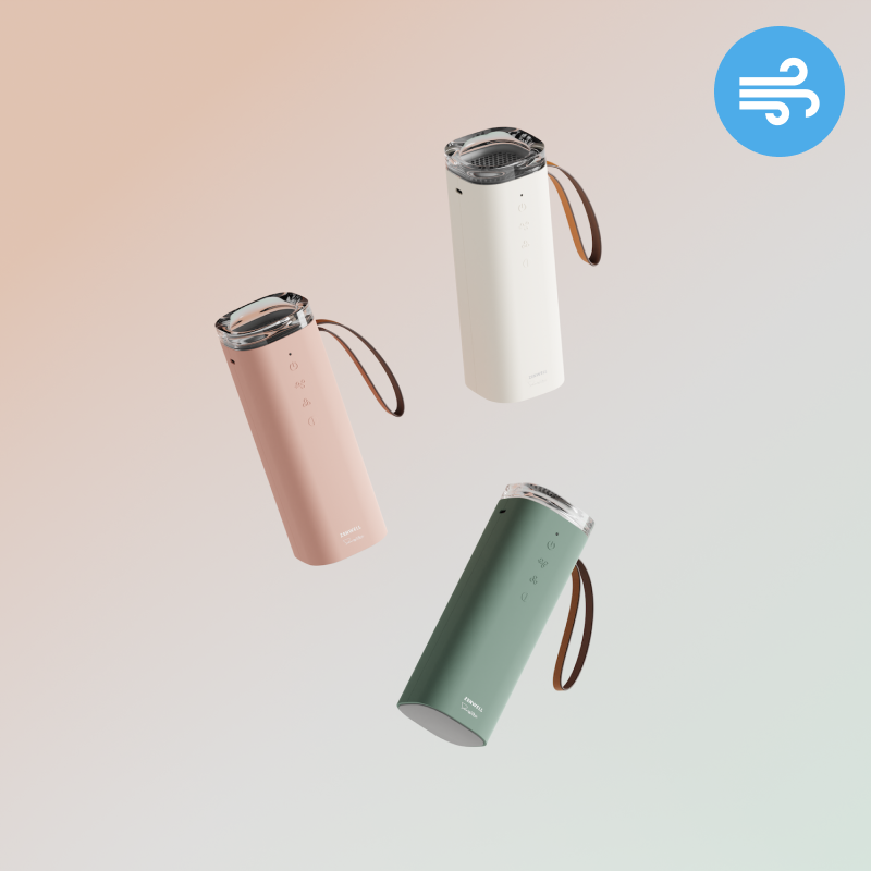 Pink, White, and Green Zenwell Air Doctor portable purifiers rendered floating in the air