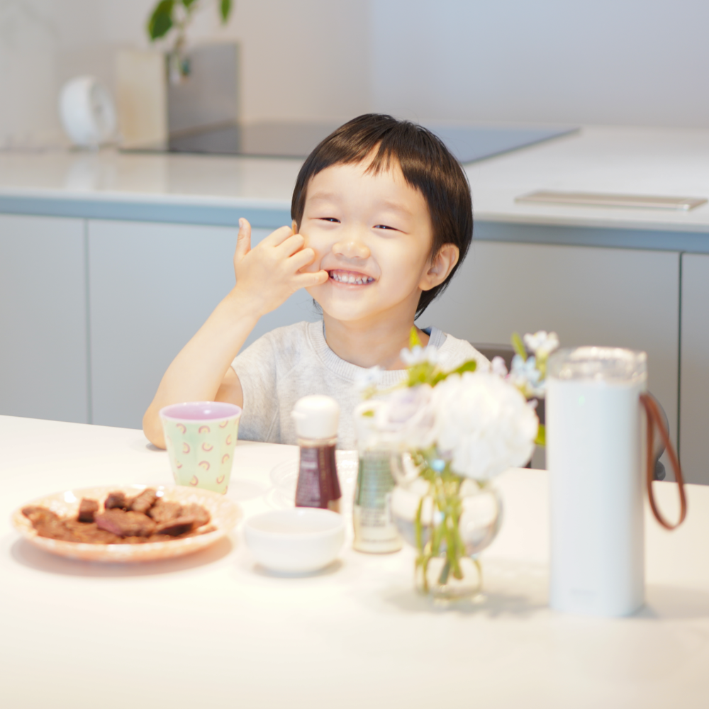 Baby Safe Air Doctor on kitchen table with toddler snacking