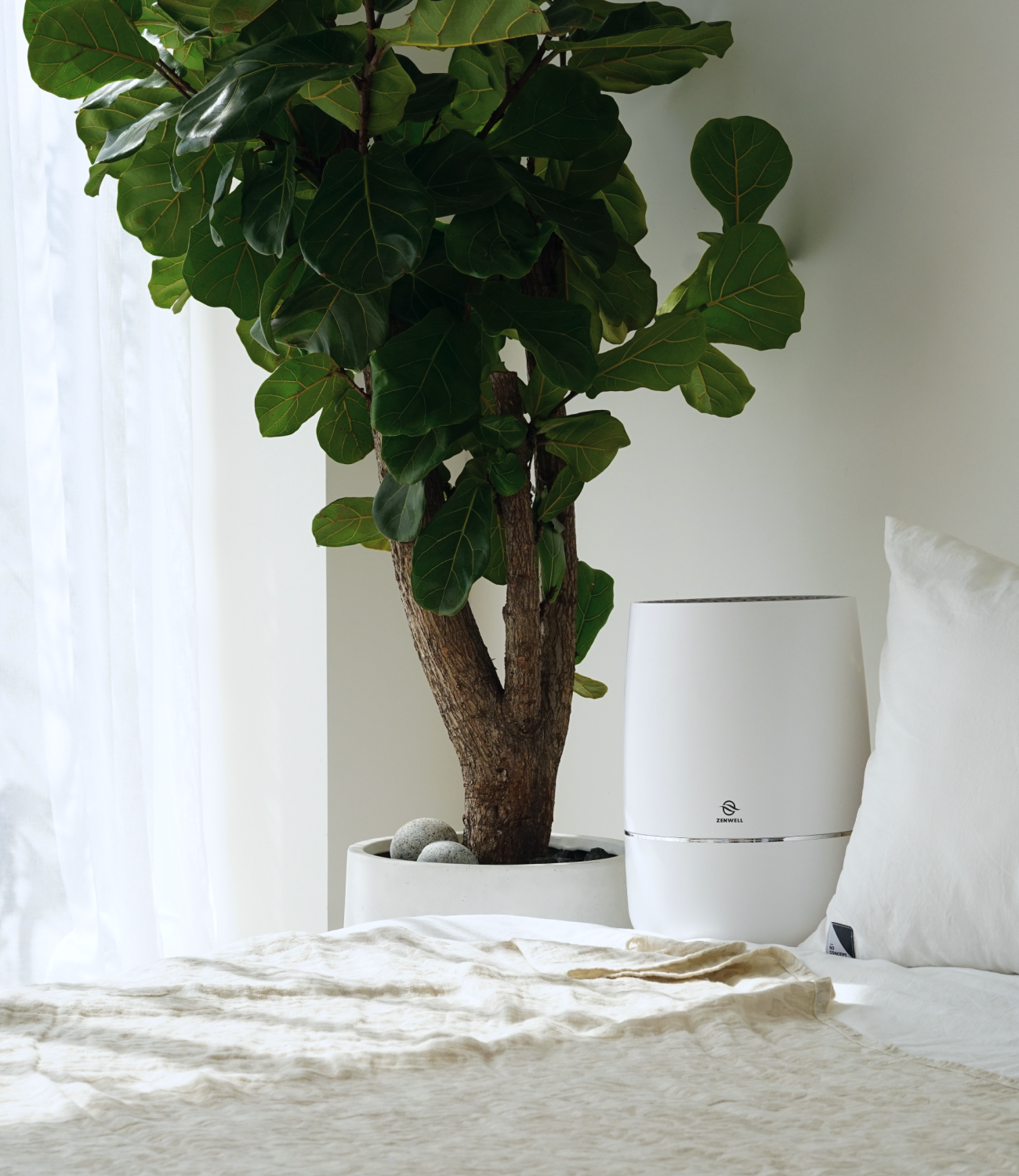 Zenwell Humidifier + Purifier placed in clean bedroom