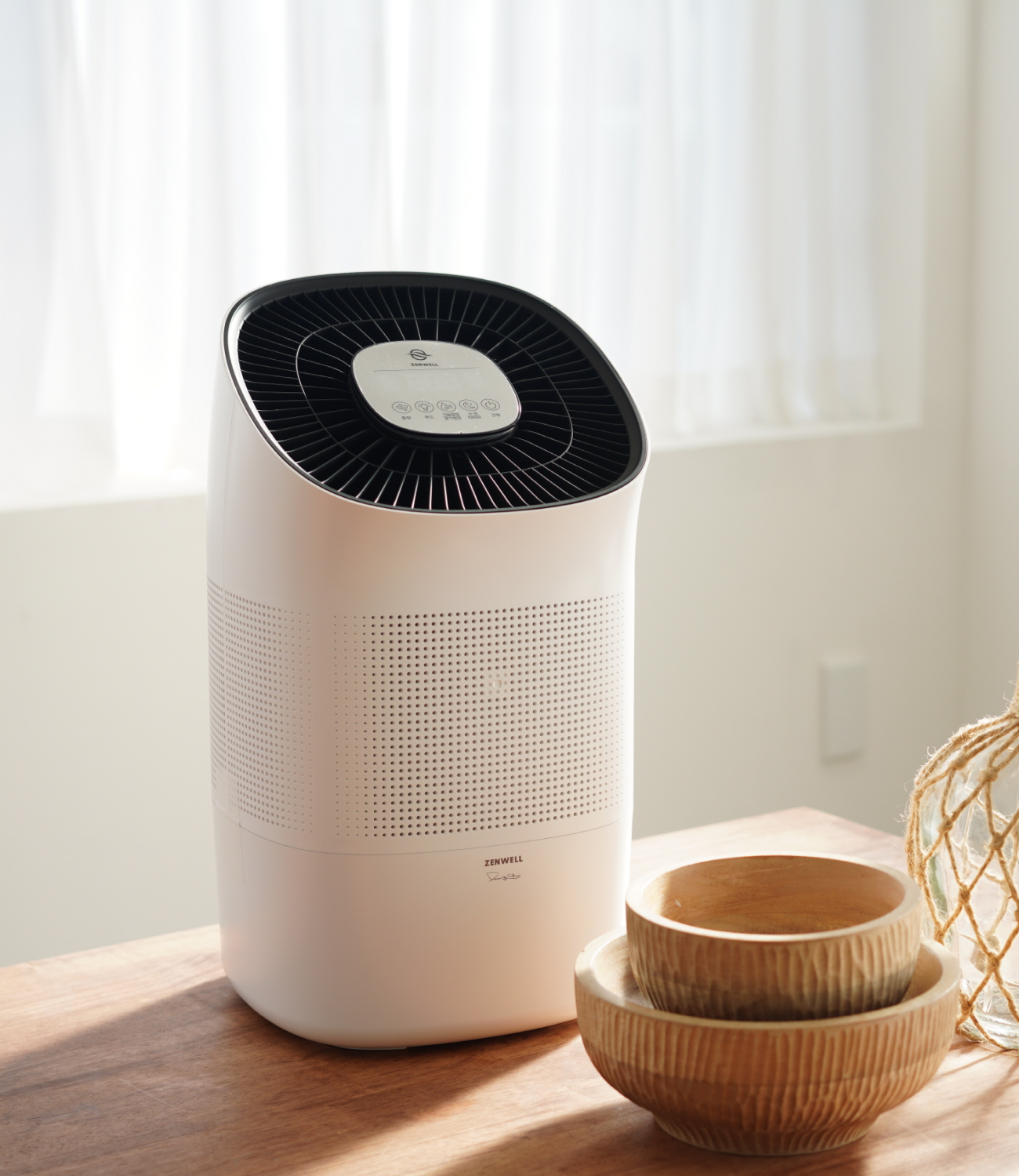 Zenwell Super Air Purifier + Humidifier on table with decor in sunny room
