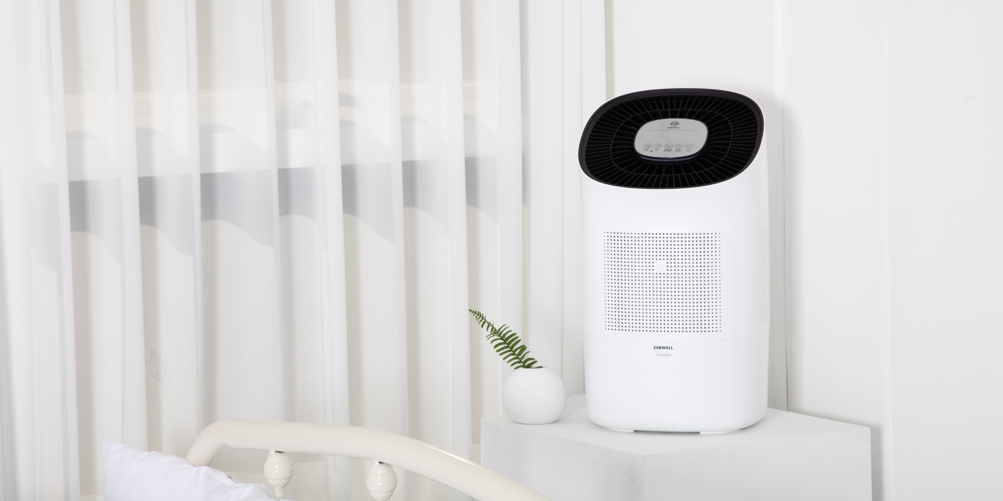 Zenwell Super Humidifier + Purifier placed in clean bedroom 